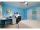Bedroom with light-blue walls, a bed and windows providing natural light at 29 Meander Row, Charleston, SC 29412