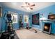 Bedroom featuring light-blue walls, natural light, and exercise equipment at 29 Meander Row, Charleston, SC 29412