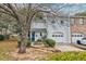Charming two-story home with a well-manicured lawn and attached garage at 29 Meander Row, Charleston, SC 29412