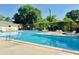 Sparkling community swimming pool with lounge chairs, perfect for relaxing on sunny days at 29 Meander Row, Charleston, SC 29412