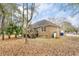 Backyard featuring mature trees and a wooden deck at 298 Hook Ln, Mount Pleasant, SC 29464