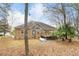 Large backyard with mature trees and a wooden deck at 298 Hook Ln, Mount Pleasant, SC 29464