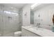 Bright bathroom with a marble vanity, modern fixtures, and glass enclosed shower at 298 Hook Ln, Mount Pleasant, SC 29464