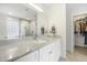 Elegant bathroom features a marble vanity with a modern faucet and walk-in closet at 298 Hook Ln, Mount Pleasant, SC 29464