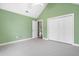 Bright bedroom with high ceilings, large closet, and patterned carpeting at 298 Hook Ln, Mount Pleasant, SC 29464