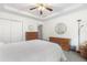 Spacious bedroom featuring a ceiling fan, decorative lighting, and hardwood dressers at 298 Hook Ln, Mount Pleasant, SC 29464