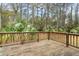 Spacious wooden deck area surrounded by trees and shrubbery at 298 Hook Ln, Mount Pleasant, SC 29464