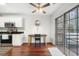 Bright dining area features sliding glass doors and wood floors at 298 Hook Ln, Mount Pleasant, SC 29464