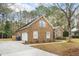 Brick home with attached garage and mature landscaping at 298 Hook Ln, Mount Pleasant, SC 29464