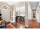 Elegant foyer features hardwood floors, a decorative mirror and chandelier for an inviting welcome at 298 Hook Ln, Mount Pleasant, SC 29464