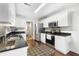 Kitchen with white cabinets, granite counters and stainless steel appliances at 298 Hook Ln, Mount Pleasant, SC 29464