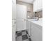 Laundry room equipped with washer and dryer, and white cabinets at 298 Hook Ln, Mount Pleasant, SC 29464