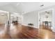Open floor plan featuring hardwood floors, dining room, entry and view to the kitchen at 298 Hook Ln, Mount Pleasant, SC 29464