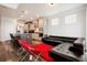 Open concept living area connected to the kitchen with modern decor and hardwood flooring at 306 Todder Trl, Goose Creek, SC 29445
