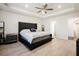 Spacious main bedroom with tray ceiling, ceiling fan, and natural light at 306 Todder Trl, Goose Creek, SC 29445