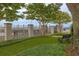 Scenic outdoor space with lush landscaping, a relaxing bench, and a view of the nearby marina at 330 Concord St # Th 9, Charleston, SC 29401
