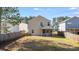 The rear exterior reveals a fenced yard, an outdoor patio, and a well-maintained lawn at 346 Iveson Rd, Summerville, SC 29486