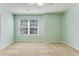 Bedroom with carpet, a window and light green walls at 346 Iveson Rd, Summerville, SC 29486