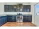 Updated kitchen featuring stainless steel appliances and plenty of counter space at 346 Iveson Rd, Summerville, SC 29486
