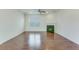 Cozy living room with a fireplace, hardwood floors, and a ceiling fan at 346 Iveson Rd, Summerville, SC 29486