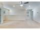 Bright loft with neutral carpet, ceiling fan, recessed lighting and a partial wall overlooking another space at 346 Iveson Rd, Summerville, SC 29486