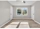 Bright empty bedroom with lots of natural light and closet space at 3484 Johan Blvd, Johns Island, SC 29455