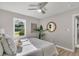 Serene bedroom with plush bedding, stylish decor, and ample natural light from the window at 3484 Johan Blvd, Johns Island, SC 29455
