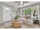 Bright living room features stylish decor, a large window, and neutral accents at 3484 Johan Blvd, Johns Island, SC 29455