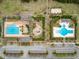 Aerial view of community amenities including swimming pools, playground, parking, and landscaped green spaces at 3600 Henrietta Hartford Rd, Mount Pleasant, SC 29466