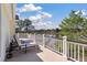 Bask in the sunshine on this balcony with waterfront views and lounge chairs at 3600 Henrietta Hartford Rd, Mount Pleasant, SC 29466