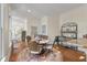 Cozy dining area with hardwood floors, a round table with 4 chairs, and elegant furnishings at 3600 Henrietta Hartford Rd, Mount Pleasant, SC 29466