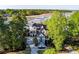 Stunning waterfront home featuring a manicured lawn and a private dock, perfect for enjoying waterfront living at 3600 Henrietta Hartford Rd, Mount Pleasant, SC 29466