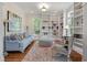 Cozy living room featuring built-in bookshelves and plush seating, perfect for relaxing at 3600 Henrietta Hartford Rd, Mount Pleasant, SC 29466
