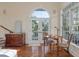 Cozy sitting area featuring french doors, dark wood floors, and a chess table for relaxation at 3600 Henrietta Hartford Rd, Mount Pleasant, SC 29466