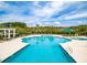 A luxurious swimming pool surrounded by chairs and umbrellas, perfect for a relaxing day in the sun at 3600 Henrietta Hartford Rd, Mount Pleasant, SC 29466