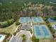 Aerial view of well-maintained tennis courts, perfect for an active lifestyle, in this beautiful community at 3600 Henrietta Hartford Rd, Mount Pleasant, SC 29466