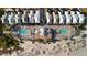 Stunning aerial view of beachside condos with pools, beach access, and immaculately landscaped grounds at 40 Grand Pavilion Blvd, Isle of Palms, SC 29451