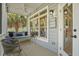 Relaxing back porch featuring comfortable seating and pleasant outdoor views at 40 Grand Pavilion Blvd, Isle of Palms, SC 29451