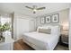 Spacious bedroom featuring a ceiling fan, and white bedding for a clean and modern look at 40 Grand Pavilion Blvd, Isle of Palms, SC 29451
