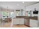 Inviting eat-in kitchen area with a sunny breakfast nook and stainless steel dishwasher at 40 Grand Pavilion Blvd, Isle of Palms, SC 29451