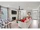 Comfortable living room with a fireplace, large windows, and cozy seating arrangements at 40 Grand Pavilion Blvd, Isle of Palms, SC 29451