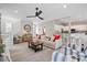 Inviting living room with a fireplace, open layout, and stylish decor at 40 Grand Pavilion Blvd, Isle of Palms, SC 29451