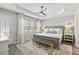 Relaxing main bedroom with a tray ceiling, plush rug, and ample natural light at 40 Grand Pavilion Blvd, Isle of Palms, SC 29451