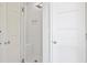 Walk-in shower with white subway tile, a built-in niche, bench, and mosaic tile flooring at 40 Grand Pavilion Blvd, Isle of Palms, SC 29451