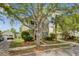 Beautiful two-story home featuring a welcoming front porch and landscaped front yard at 41 Regency Oaks Dr, Summerville, SC 29485