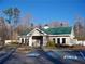 Exterior view of the community clubhouse with convenient accessible parking spaces at 41 Regency Oaks Dr, Summerville, SC 29485