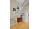 Bright foyer with hardwood floors, staircase, and decorative accents creating a welcoming entrance at 41 Regency Oaks Dr, Summerville, SC 29485