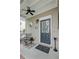 Cozy front porch with seating, decorative details, and a welcoming entrance at 41 Regency Oaks Dr, Summerville, SC 29485