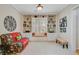 Bright office featuring custom built-in shelving, window seat, and comfortable seating at 41 Regency Oaks Dr, Summerville, SC 29485