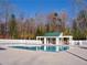 Inviting community pool with a gazebo and ample lounging space for residents at 41 Regency Oaks Dr, Summerville, SC 29485